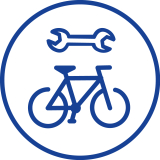 Blaues Symbol für Fahrradreparaturdienst: Fahrrad mit Schraubenschlüssel darüber, symbolisiert die Wartung von Fahrrädern.